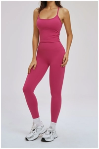 Front view of rose red yoga set with cross back tank top and high waist leggings