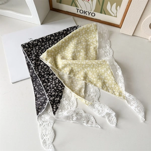 Floral headscarves with white lace trim shown in black and yellow printed patterns