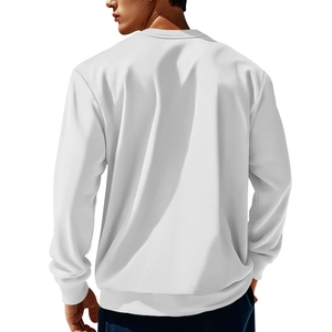 Detailed back view of a white crewneck sweatshirt with corduroy patchwork and drop shoulders