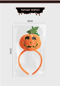 Package display of the Halloween pumpkin headband showing 27cm height and 18cm width