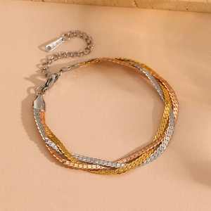 Close-up of tricolor woven snake chains with lobster clasp and adjustable link