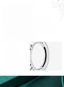 Detail of 925 sterling silver geometric earrings with hand-set 5A cubic zirconia stones