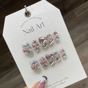 Sparkling pink heart and star rhinestones on handmade luxury press-on nails with glitter