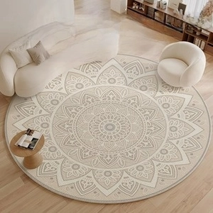 Detail of soft loop velvet round rug with cream mandala patterns on wood floor