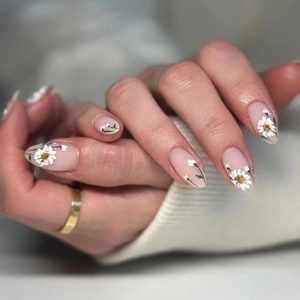 5D embossed white daisy nail stickers on nude pink base for fresh spring manicure