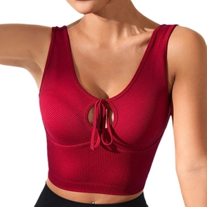 Red ribbed yoga sports bra with deep V-neck, cutout front, and drawstring details