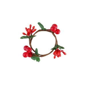 Christmas napkin ring with red artificial berries and green leaves on a vine wreath