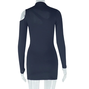 Detail of black long sleeve bodycon dress showing cutout shoulder and stand collar