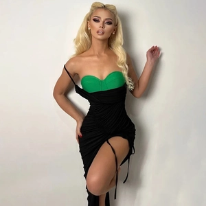 Detail showing sexy black mesh drawstring dress with green tube top insert on model