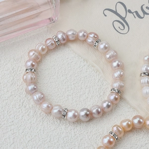 Elegant natural pink freshwater pearl bracelet with sparkling silver rhinestone spacers