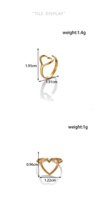 Detailed size comparison of two hollow heart rings in gold-plated stainless steel