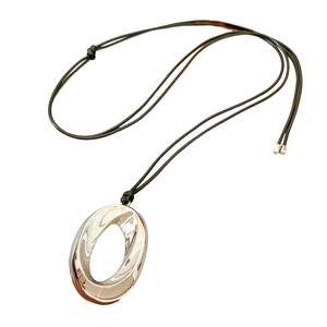 Minimalist silver irregular oval pendant on black leather cord necklace for women