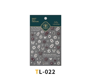 Macro view of 5D nail stickers with 3D white flowers and deep red butterfly designs