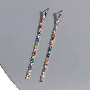 Colorful crystal tassel drop earrings featuring multi-color stones in a silver setting