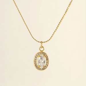 Detail shot of a double-layered 18K gold-plated necklace with an oval zirconia pendant