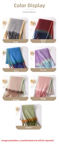 Close-up of thick knit scarves with long tassels in a variety of vibrant gradient colors