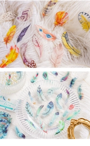 Detailed close-up of decorative PET feather stickers for scrapbooking and DIY crafts