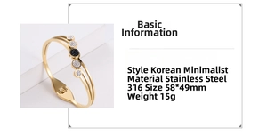 Detail view of gold stainless steel bangle with inlaid zircons and size specifications