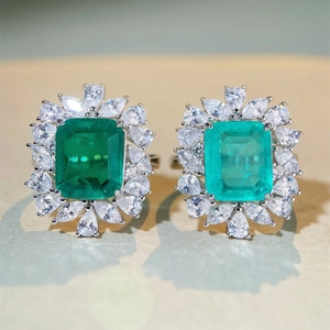 Luxurious S925 silver ring featuring a rectangular emerald and white pear-shaped zircons