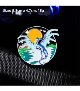 Detail view of the enamel flying dragon brooch with 5.3cm x 4.7cm size specifications