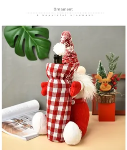 Detail of red and white checkered knit Christmas gnome wine bottle cover with drawstring