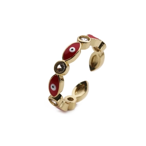 Detail of adjustable gold ring with red enamel evil eye and micro-inlaid zircon