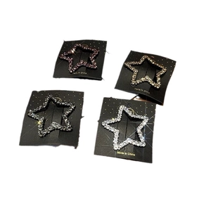Funkelndes Set aus sternförmigen Strass-Haarspangen in Schwarz, Gold und Silber