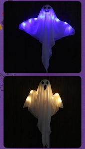 Detail of Halloween glowing ghost hanging decor with blue and warm white LED lights