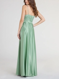 Elegant sage green satin evening dress with thin straps and a slim-fit open back design
