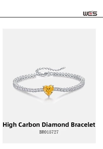 Dettaglio macro della collana tennis in argento S925 con pendente a cuore in diamante giallo