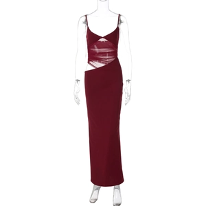 Detail of burgundy slit dress featuring sheer mesh patchwork and asymmetric cutout waist