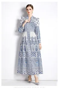 Full-length view of blue and white vintage floral maxi dress with lantern sleeves