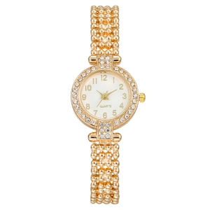Elegant gold quartz watch for women with rhinestone bezel and metal link bracelet