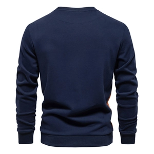 Back view of men's navy blue crewneck sweatshirt with ribbed cuffs and hem details