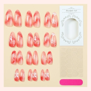 Almond red velvet gradient press-on nails with floral art and rhinestone accents