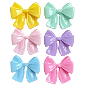 Colorful resin bow charms in six vibrant shades for creative DIY crafts and accessories