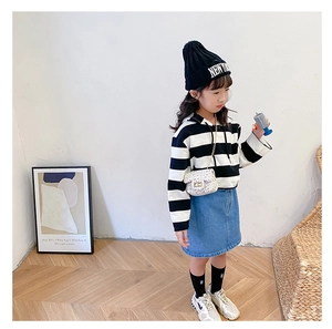 Kids fashion set featuring striped hoodie, denim skirt, beanie and white sequin bag