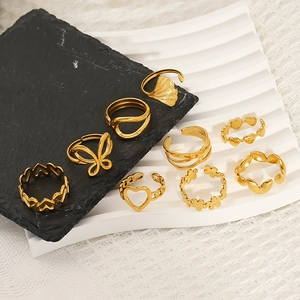 9-piece set of gold vintage stainless steel open rings with butterfly and floral designs