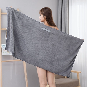 Detail of dark grey coral fleece hair towel showing high-absorbency waffle texture