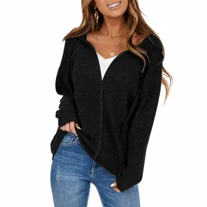 Close-up of army green waffle knit jacket with drawstring hood and casual zipper detail
