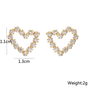 Detailed view of 18K gold plated heart stud earrings with cubic zirconia stones