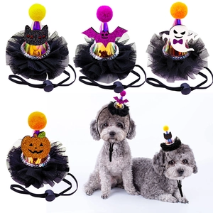 Detail of Halloween pet hats with pumpkin bat motifs and adjustable chin straps