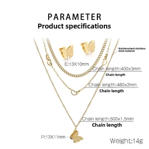 Detailed view of gold stainless steel necklace set with heart and butterfly charms
