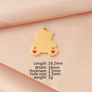 Detailed dimensions of the gold bear charm with red heart showing length 18.2mm and width 16mm