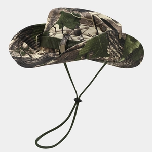 Detail of camouflage sun hat featuring metal ventilation eyelets and snap buttons