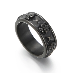 Gothic punk black titanium steel ring featuring embossed skulls and cross star patterns
