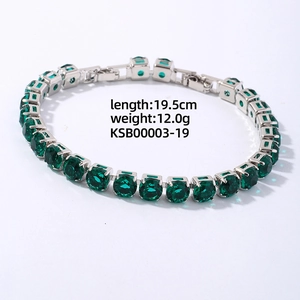 Detail of emerald tennis bracelet with silver frame measuring 19.5cm and 12.0g