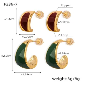 Detailed size comparison and measurements of vintage crescent enamel copper earrings