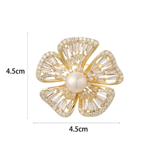 Elegant floral freshwater pearl brooch with sparkling zircon inlays on golden petals