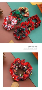 Detail of Christmas plaid scrunchies with white snowflake patterns in five colors